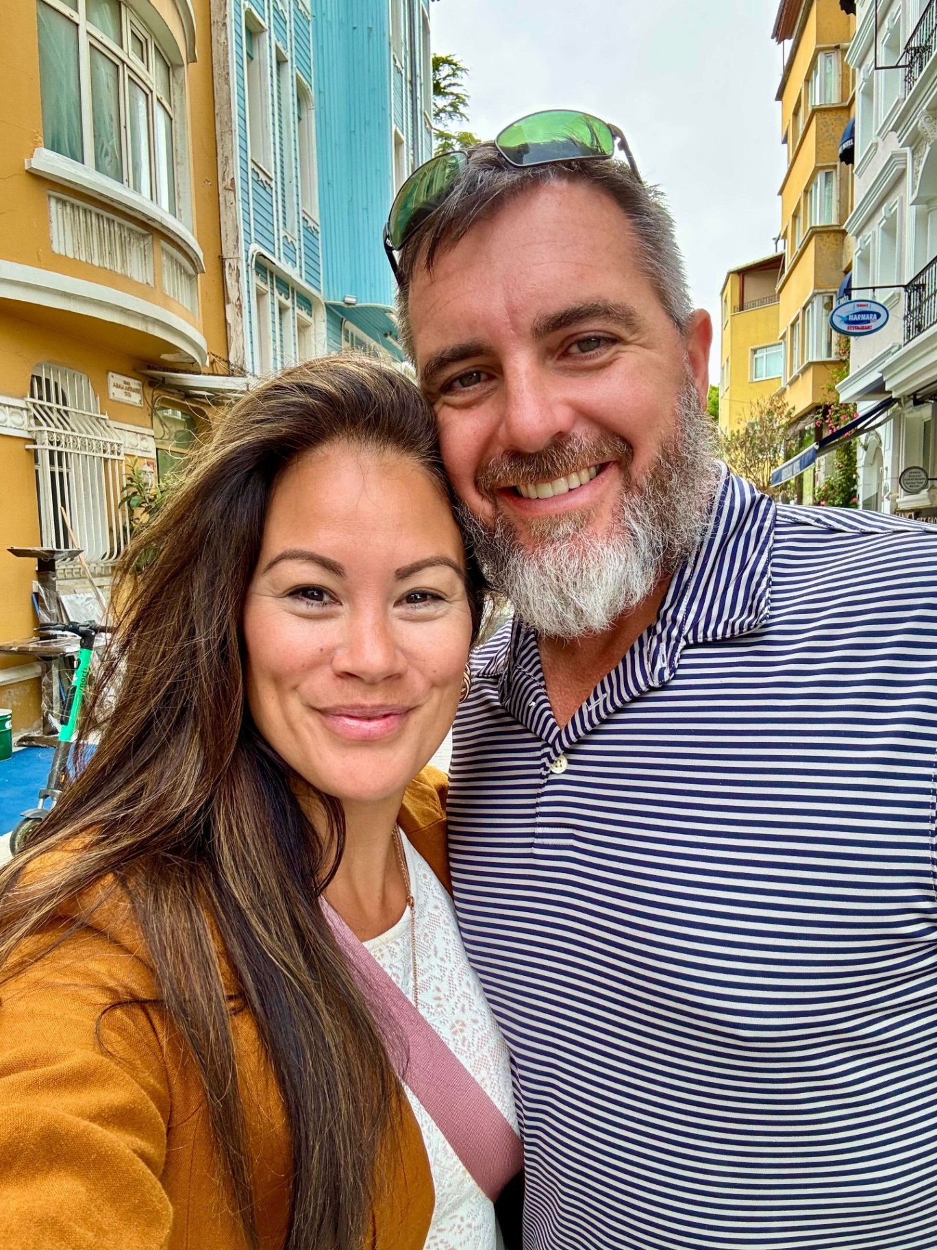Noelle and Joe smiling on a street in Istanbul