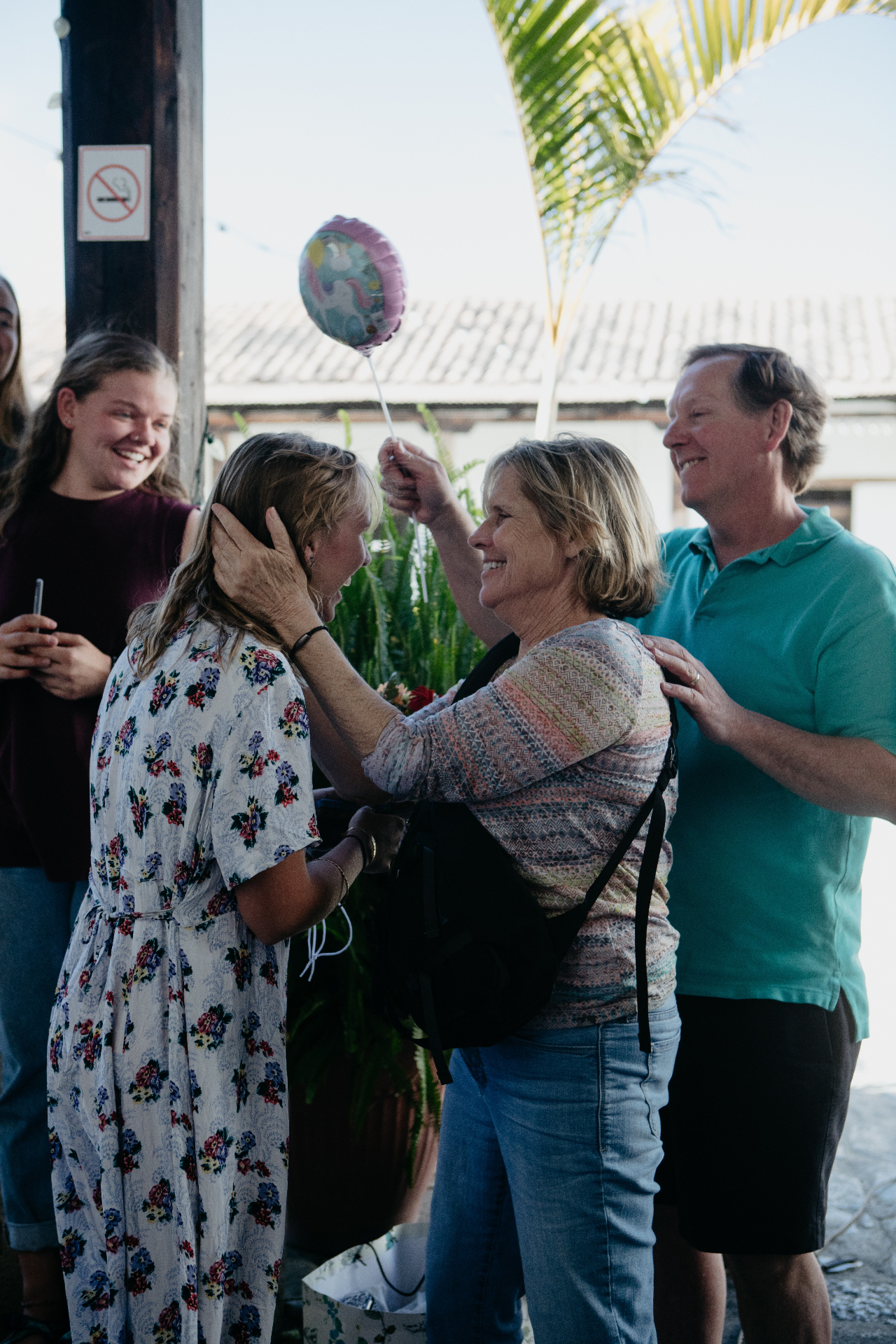 A mom blessing and praying over another parent on a Parent Vision Trip